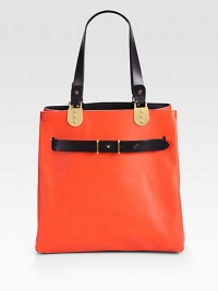 A sleek carryall for your on-the-go essentials, impeccably crafted of butter-soft Italian leather in contrasting tones. Double top handles, 8¾ dropOne inner zip pouchReverses to black leather12W X 12H X 6DMade in Italy A sleek carryall for your on-the-go essentials, impeccably crafted of butter-soft Italian leather in contrasting tones. Double top handles, 8¾ dropOne inner zip pouchReverses to black leather12W X 12H X 6DMade in Italy