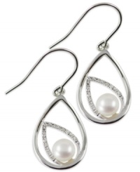 Shapely chic. This sterling silver pair of double teardrop earrings dazzles with round-cut diamonds (1/10 ct. t.w.) and a cultured freshwater pearl (7-7-1/2 mm) for a classic touch. Approximate drop length: 1-1/3 inches. Approximate drop width: 5/8 inch. Shapely chic. This sterling silver pair of double teardrop earrings dazzles with round-cut diamonds (1/10 ct. t.w.) and a cultured freshwater pearl (7-7-1/2 mm) for a classic touch. Approximate drop length: 1-1/3 inches. Approximate drop width: 5/8 inch.