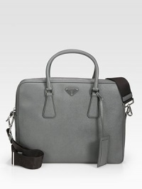 Sharp and sophisticated in textured saffiano leather with detachable shoulder strap.Zip closureDouble top handlesAdjustable shoulder strapInterior pocketsFully lined14¼W x 11¼H x 3¼DMade in Italy Sharp and sophisticated in textured saffiano leather with detachable shoulder strap.Zip closureDouble top handlesAdjustable shoulder strapInterior pocketsFully lined14¼W x 11¼H x 3¼DMade in Italy