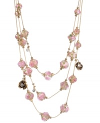 Petal perfection. Pretty pink flowers adorn the layered beads on Betsey Johnson's lovely illusion-style chain necklace. Embellished with flower charms and sparkling crystals, it's crafted in gold tone mixed metal. Approximate length: 18 inches + 3-inch extender. Petal perfection. Pretty pink flowers adorn the layered beads on Betsey Johnson's lovely illusion-style chain necklace. Embellished with flower charms and sparkling crystals, it's crafted in gold tone mixed metal. Approximate length: 18 inches + 3-inch extender.