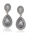 Frame your face with whimsical drops. Carolee earrings feature oval and pear-cut crystals surrounded by round-cut crystal accents in silver tone mixed metal. Approximate drop: 1-1/4 inches.