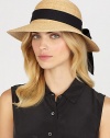 Fine braided raffia accented with polka dot ribbon trim can be worn with brim turned up or rolled down. Bow at back Adjustable sizing cord Brim, about 3½ Imported