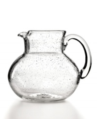 Simply stylish, this Iris pitcher makes a splash in any setting with tiny bubbles trapped in dishwasher-safe glass. From Artland's serveware collection. Simply stylish, this Iris pitcher makes a splash in any setting with tiny bubbles trapped in dishwasher-safe glass. From Artland's serveware collection.
