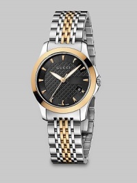 From the G-Timeless Collection. A two-tone design with a black diamond pattern dial and a stainless steel link and pink gold PVD bracelet.Swiss quartz movementWater resistant to 5 ATMRound stainless steel case, 27mm (1)Smooth pink gold PVD bezelBlack diamond pattern dial with markersDate display at 4 o'clockSecond handStainless steel and pink gold PVD link braceletMade in Switzerland From the G-Timeless Collection. A two-tone design with a black diamond pattern dial and a stainless steel link and pink gold PVD bracelet.Swiss quartz movementWater resistant to 5 ATMRound stainless steel case, 27mm (1)Smooth pink gold PVD bezelBlack diamond pattern dial with markersDate display at 4 o'clockSecond handStainless steel and pink gold PVD link braceletMade in Switzerland