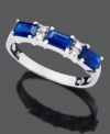 Eye-catching octagon-cut sapphire (1 ct. t.w.) shines amidst sparkling diamond accents on this 14k white gold ring.