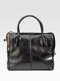 Fine leather satchel with goldtone hardware accents has an adjustable messenger strap. Double handles, 5 drop Messenger strap, 17½-19½ drop Snap closure Metal feet Inside pockets Leather lining 17½W X 13½H X 5½D Made in Italy Fine leather satchel with goldtone hardware accents has an adjustable messenger strap. Double handles, 5 drop Messenger strap, 17½-19½ drop Snap closure Metal feet Inside pockets Leather lining 17½W X 13½H X 5½D Made in Italy