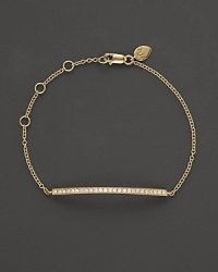 Diamonds sparkle in a slim 14K. white gold bar. By Meira T. Diamonds sparkle in a slim 14K. white gold bar. By Meira T.