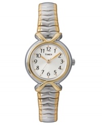 Expand your options with this beautiful Timex dress watch. Goldtone and silvertone stainless steel bracelet and mixed metal case. White dial with goldtone dot markers, black numerals and logo. Analog movement. One-year limited warranty. Expand your options with this beautiful Timex dress watch. Goldtone and silvertone stainless steel bracelet and mixed metal case. White dial with goldtone dot markers, black numerals and logo. Analog movement. One-year limited warranty.