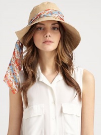 A floppy and fabulous warm-weather ready topper in soft, crisp canvas with a convertible brim and a colorful, removable scarf.CanvasBrim, about 4Imported A floppy and fabulous warm-weather ready topper in soft, crisp canvas with a convertible brim and a colorful, removable scarf.CanvasBrim, about 4Imported