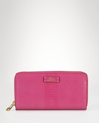 An exotically textured leather Lauren Ralph Lauren wallet is an always essential. It features an effortless, zip around design and assigned spaces for your checkbook, change, and cards. An exotically textured leather Lauren Ralph Lauren wallet is an always essential. It features an effortless, zip around design and assigned spaces for your checkbook, change, and cards.
