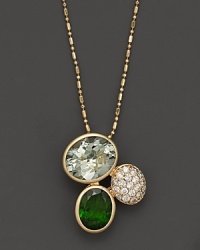 A head-turning cluster of chrome diopside and prasiolite, set in 14K yellow gold. A head-turning cluster of chrome diopside and prasiolite, set in 14K yellow gold.