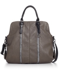 Make a definitive style statement with this edgy upgrade on the classic tote design. Stud accents and belted detailing add interest to the outside, while the generous interior carries off your essentials with ease. Make a definitive style statement with this edgy upgrade on the classic tote design. Stud accents and belted detailing add interest to the outside, while the generous interior carries off your essentials with ease.