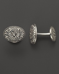 Elegant, intricately textured sterling silver cufflinks from Buccellati. Elegant, intricately textured sterling silver cufflinks from Buccellati.