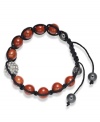 Spiritual-inspired bracelets are all the rage this season! Snap up this hot style from Ali Khan featuring semi-precious red jasper beads and pave glass fireballs on a trendy black cord. Bracelet adjusts to fit the wrist. Approximate diameter: 2 inches. Approximate length: 12-1/4 inches.