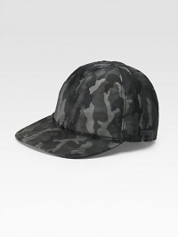 A sporty baseball cap crafted in camouflaged nylon with tonal colors and contemporary appeal. Stitched brim Made in Italy