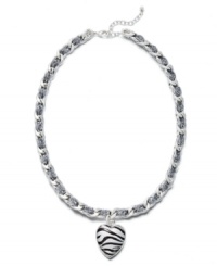 Perfect for prowling. Charter Club combines romance and wilderness in this chic heart charm pendant. Crafted in silver tone mixed metal, necklace features a zebra print resin charm and ribbon decor. Approximate length: 15 inches + 2-inch extender. Approximate drop: 1-1/4 inches. Perfect for prowling. Charter Club combines romance and wilderness in this chic heart charm pendant. Crafted in silver tone mixed metal, necklace features a zebra print resin charm and ribbon decor. Approximate length: 15 inches + 2-inch extender. Approximate drop: 1-1/4 inches.