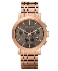 This Burberry timepiece features a rose-gold ion-plated check-inspired bracelet and round case. Gunmetal check-patterned chronograph dial features rose-gold tone stick indices, three subdials, date window at four o'clock, three hands and logo. Swiss quartz movement. Water resistant to 50 meters. Two-year limited warranty. This Burberry timepiece features a rose-gold ion-plated check-inspired bracelet and round case. Gunmetal check-patterned chronograph dial features rose-gold tone stick indices, three subdials, date window at four o'clock, three hands and logo. Swiss quartz movement. Water resistant to 50 meters. Two-year limited warranty.