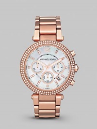 This warm rose gold timepiece shines with a crystal bezel. Quartz movement Water resistant to 5 ATM Round rose goldplated stainless steel case, 39mm (1.5) Crystal bezel Mother-of-pearl dial Arabic numeral and bar hour markers Second hand Rose goldplated stainless steel link bracelet Imported 