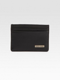 A polished card case in smooth leather with front logo plaque detail.Two card slotsOne ID window slotLeather4W x 3HImported A polished card case in smooth leather with front logo plaque detail.Two card slotsOne ID window slotLeather4W x 3HImported