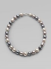 A soft melange of grey, nuage and white baroque man-made pearls creates drama at the neck. 14mm multicolor organic baroque pearls Length, about 20 Sterling silver spring clip clasp Made in Spain A soft melange of grey, nuage and white baroque man-made pearls creates drama at the neck. 14mm multicolor organic baroque pearls Length, about 20 Sterling silver spring clip clasp Made in Spain