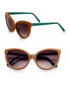 This unique and tactile style features a supple leather, retro-inspired frame with luxurious snakeskin temples. Available in brown leather-green skin with smoke gradient lens. Leather wrapped framesSnakeskin temples100% UV protectionImported