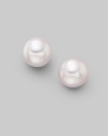From the Akoya Collection. Classic white cultured pearl studs set in 18k gold. 7mm white round cultured pearls Quality: A 18k white gold Post back Imported