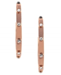 Stunning and sparkling. These open hoop earrings from Vince Camuto are crafted from polished rose gold-tone mixed metal with crystal accents adorning the outside for added luster. The earrings feature a post with friction-back closure. Approximate drop: 1-3/4 inches. Stunning and sparkling. These open hoop earrings from Vince Camuto are crafted from polished rose gold-tone mixed metal with crystal accents adorning the outside for added luster. The earrings feature a post with friction-back closure. Approximate drop: 1-3/4 inches.