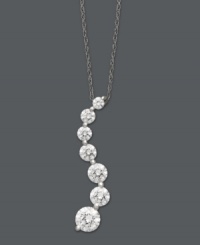 A beautiful pendant symbolic for the journey of life and the unique path we take, this Arabella design highlights graduated, round-cut Swarovski zirconias (4-5/8 ct. t.w.) set in 14k white gold. Approximate length: 18 inches. Approximate drop: 1/2 inch. A beautiful pendant symbolic for the journey of life and the unique path we take, this Arabella design highlights graduated, round-cut Swarovski zirconias (4-5/8 ct. t.w.) set in 14k white gold. Approximate length: 18 inches. Approximate drop: 1/2 inch.