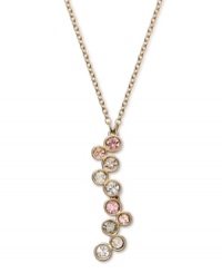 Alluringly asymmetrical. A distinctively designed silhouette makes a striking statement on Swarovski's Fidelity Silk pendant necklace. Multicolored pastel crystals in a beautiful bezel setting complement the gold tone mixed metal setting. Approximate length: 16 inches. Approximate drop: 1-1/2 inches. Alluringly asymmetrical. A distinctively designed silhouette makes a striking statement on Swarovski's Fidelity Silk pendant necklace. Multicolored pastel crystals in a beautiful bezel setting complement the gold tone mixed metal setting. Approximate length: 16 inches. Approximate drop: 1-1/2 inches.