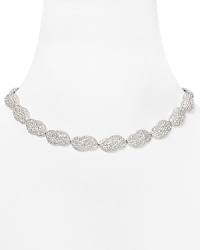 All eyes are sure to be on this pave-station necklace from Lora Paolo, accented by cloud-like crystals and cast in rhodium plated metal. All eyes are sure to be on this pave-station necklace from Lora Paolo, accented by cloud-like crystals and cast in rhodium plated metal.