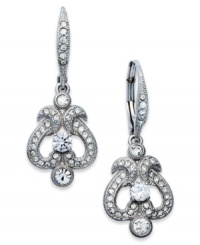 An elegant dazzler from Eliot Danori. Glittering crystals combine with cubic zirconias (1/3 ct. t.w.) on these gorgeous drop earrings. Finished with a leverback closure. Set in rhodium-plated mixed metal. Approximate drop: 3/4 inch. An elegant dazzler from Eliot Danori. Glittering crystals combine with cubic zirconias (1/3 ct. t.w.) on these gorgeous drop earrings. Finished with a leverback closure. Set in rhodium-plated mixed metal. Approximate drop: 3/4 inch.