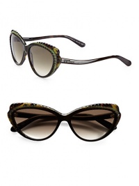 The juxtaposition of smooth acetate and textured ridges give this retro-inspired frame it's modern flair. Available in pink havana with grey-aqua gradient lens, black burgandy with grey gradient lens or green havana with brown-grey gradient lens. Logo temples100% UV protectionMade in Italy The juxtaposition of smooth acetate and textured ridges give this retro-inspired frame it's modern flair. Available in pink havana with grey-aqua gradient lens, black burgandy with grey gradient lens or green havana with brown-grey gradient lens. Logo temples100% UV protectionMade in Italy
