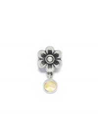 A citrine dangling jewel marks November birthdays on this sterling silver flower bead. Donatella is a playful collection of charm bracelets and necklaces that can be personalized to suit your style! Available exclusively at Macy's. A citrine dangling jewel marks November birthdays on this sterling silver flower bead. Donatella is a playful collection of charm bracelets and necklaces that can be personalized to suit your style! Available exclusively at Macy's.