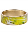 Channel the exoticism and energy of Brasil in Haskell's inspired skinny bangle. The Palm bangle features a yellow and green palm leaf print design, set in gold tone mixed metal with a hinge clasp. Approximate diameter: 2-1/2 inches. Approximate length: 8 inches. Item comes packaged in a green gift box.