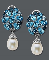 Sparkling sophistication with a hint of shimmer. Pear-cut blue topaz gemstones (4-3/8 ct. t.w.) highlight the post, while sparkling white topaz accents adorn the top of a cultured freshwater pearl (7 mm x 9 mm) in these breathtaking drop earrings. Set in sterling silver. Approximate drop: 1-1/8 inches. Sparkling sophistication with a hint of shimmer. Pear-cut blue topaz gemstones (4-3/8 ct. t.w.) highlight the post, while sparkling white topaz accents adorn the top of a cultured freshwater pearl (7 mm x 9 mm) in these breathtaking drop earrings. Set in sterling silver. Approximate drop: 1-1/8 inches.