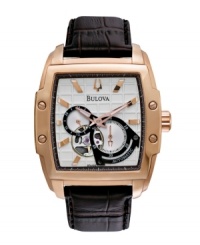 Perfection in every detail. Watch by Bulova crafted of brown croc-embossed leather strap and square rose-gold tone stainless steel case. Silver tone grid-patterned dial features applied rose-gold tone stick indices, two rose-gold tone hands, three subdials and logo. Automatic movement. Water resistant to 30 meters. Three-year limited warranty. Perfection in every detail. Watch by Bulova crafted of brown croc-embossed leather strap and square rose-gold tone stainless steel case. Silver tone grid-patterned dial features applied rose-gold tone stick indices, two rose-gold tone hands, three subdials and logo. Automatic movement. Water resistant to 30 meters. Three-year limited warranty.