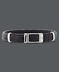 Stylish sophistication. This chic genuine crocodile leather cuff bracelet makes a sleek accent for the modern man. Set in sterling silver. Approximate length: 8-1/2 inches. Approximate width: 3/8 inch. Stylish sophistication. This chic genuine crocodile leather cuff bracelet makes a sleek accent for the modern man. Set in sterling silver. Approximate length: 8-1/2 inches. Approximate width: 3/8 inch.