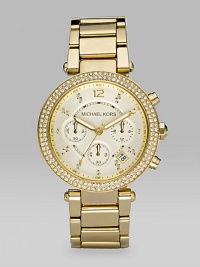 A dazzling goldplated stainless steel timepiece with Swarovski crystal accents and light champagne chronograph dial.Quartz movement Water resistant to 10 ATM Swarovski crystal bezel Goldplated stainless steel round case, 39mm, (1.54) Light champagne chronograph dial Arabic numeral and Swarovski crystal index hour markers Date display between 4 and 5 o'clock Second hand Goldplated stainless steel link bracelet Buckle closure Imported A dazzling goldplated stainless steel timepiece with Swarovski crystal accents and light champagne chronograph dial.Quartz movement Water resistant to 10 ATM Swarovski crystal bezel Goldplated stainless steel round case, 39mm, (1.54) Light champagne chronograph dial Arabic numeral and Swarovski crystal index hour markers Date display between 4 and 5 o'clock Second hand Goldplated stainless steel link bracelet Buckle closure Imported