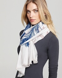 Printed with felt flowers and peacock feathers, this lovely Leigh & Luca NY scarf is rendered in a silk-cotton blend made on Mongolian looms over 100 years old.Like a work of art, each limited-edition Leigh & Luca NY scarf is numbered and packaged in a signature plastic bag with instructional flag art depicting ways to wear it. Printed with felt flowers and peacock feathers, this lovely Leigh & Luca NY scarf is rendered in a silk-cotton blend made on Mongolian looms over 100 years old.Like a work of art, each limited-edition Leigh & Luca NY scarf is numbered and packaged in a signature plastic bag with instructional flag art depicting ways to wear it.
