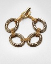 Large textured links accented with smaller wrapped link chains create an unique piece you'll wear again and again. Antique-finished goldtoneLength, about 7.75Toggle closureImported 