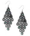 A summery remix. Lucky Brand blends semi-precious abalone and Mother of Pearl for a stylish, warm-weather look. Set in silver tone mixed metal. Approximate drop: 3-1/4 inches.