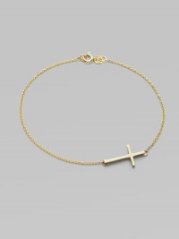 A gleaming 14k gold cross on a delicate chain.14k yellow gold Length, about 7 Pendant length, about ¾ Spring ring clasp Made in USA A gleaming 14k gold cross on a delicate chain.14k yellow gold Length, about 7 Pendant length, about ¾ Spring ring clasp Made in USA