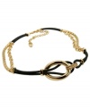 Luxe meets leather. T Tahari's trendy statement necklace combines polished 14k gold-plated mixed metal, black leather and Colorado crystal accents. Approximate length: 17 inches + 3-inch extender. Approximate drop: 1-1/4 inches.