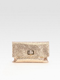 A cocktail essential covered in glittery fabric with a turnlock clasp and rich suede lining.Turnlock flap closureOne inside open pocketSuede lining9W X 6½H X 1/2DImported A cocktail essential covered in glittery fabric with a turnlock clasp and rich suede lining.Turnlock flap closureOne inside open pocketSuede lining9W X 6½H X 1/2DImported