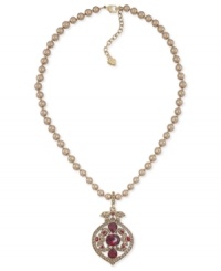 Glass pearls add elegance, ruby-colored accents add an edge in this pendant necklace from Carolee. The pendant, crafted from gold-tone mixed metal, gives a classic look an update. Approximate length: 16 inches. Approximate drop: 1-3/4 inches. Glass pearls add elegance, ruby-colored accents add an edge in this pendant necklace from Carolee. The pendant, crafted from gold-tone mixed metal, gives a classic look an update. Approximate length: 16 inches. Approximate drop: 1-3/4 inches.