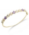 They'll look like a star. Lily Nily's children's bracelet is set in 18k gold over sterling silver with enamel accents in purple and white for a vibrant touch. Item comes packaged in a signature Lily Nily Gift Box. Approximate inside circumference: 5-3/4 inches. Approximate diameter: 2 inches.