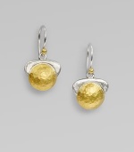 This eye-catching design features a textured drop with radiant 24k gold on one side and sleek sterling silver on the other side for a modern style. 24k goldSterling silverLength, about 1Hook backImported 