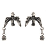 Free-flying style by Betsey Johnson. These silvertone mixed metal earrings feature crystal accents. Approximate drop: 1 inch.