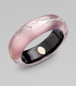 From the Star Dust Collection. Beautiful, hand-crafted lucite accented with dazzling Swarovski crystals. Hand-crafted luciteSwarovski crystalsDiameter, about 2½Hinged, magnetic closureMade in USA