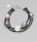This three-row piece is a beautiful mix of lustrous pearls on sturdy black leather cord. 12mm Baroque white, grey and nuage organic man-made pearls with sterling silver capsLeather cord Lobster clasp closureLength, about 7½Imported 